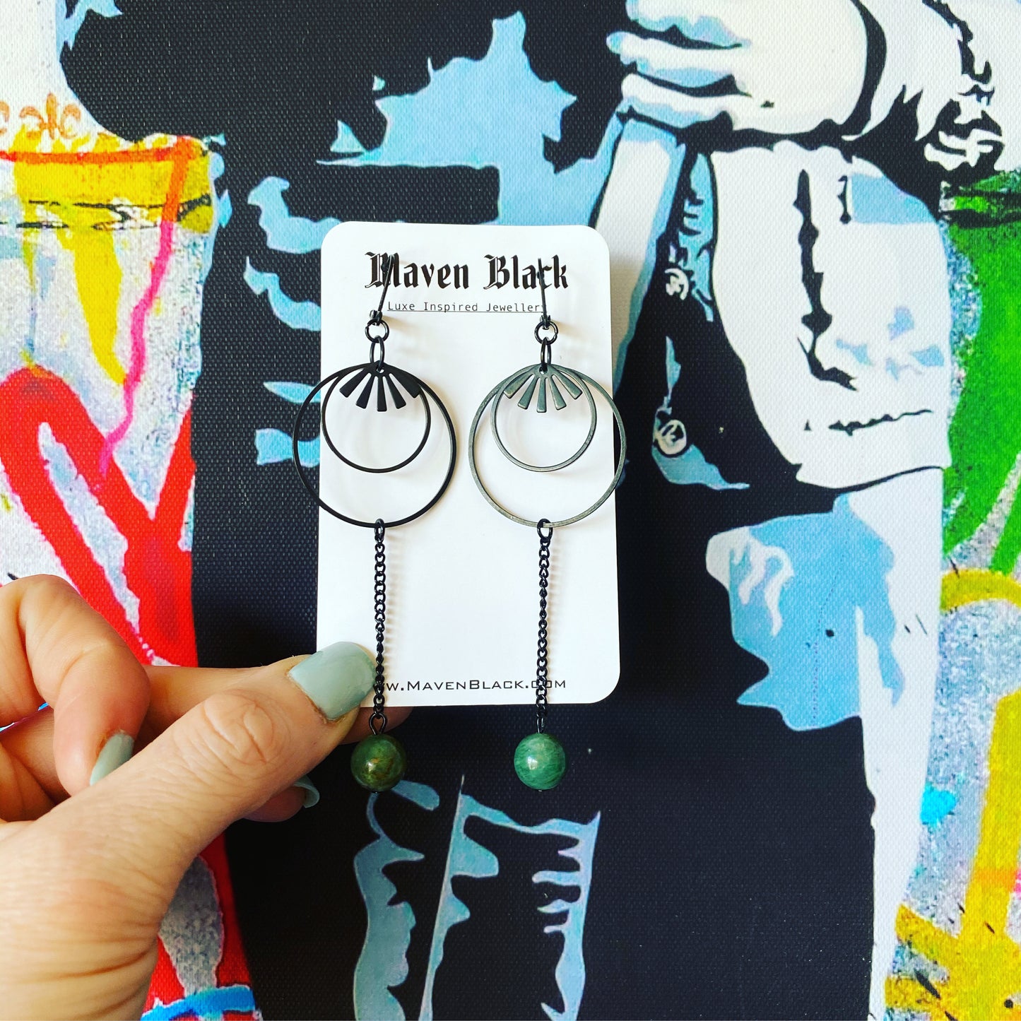 Black hole sun earrings in green